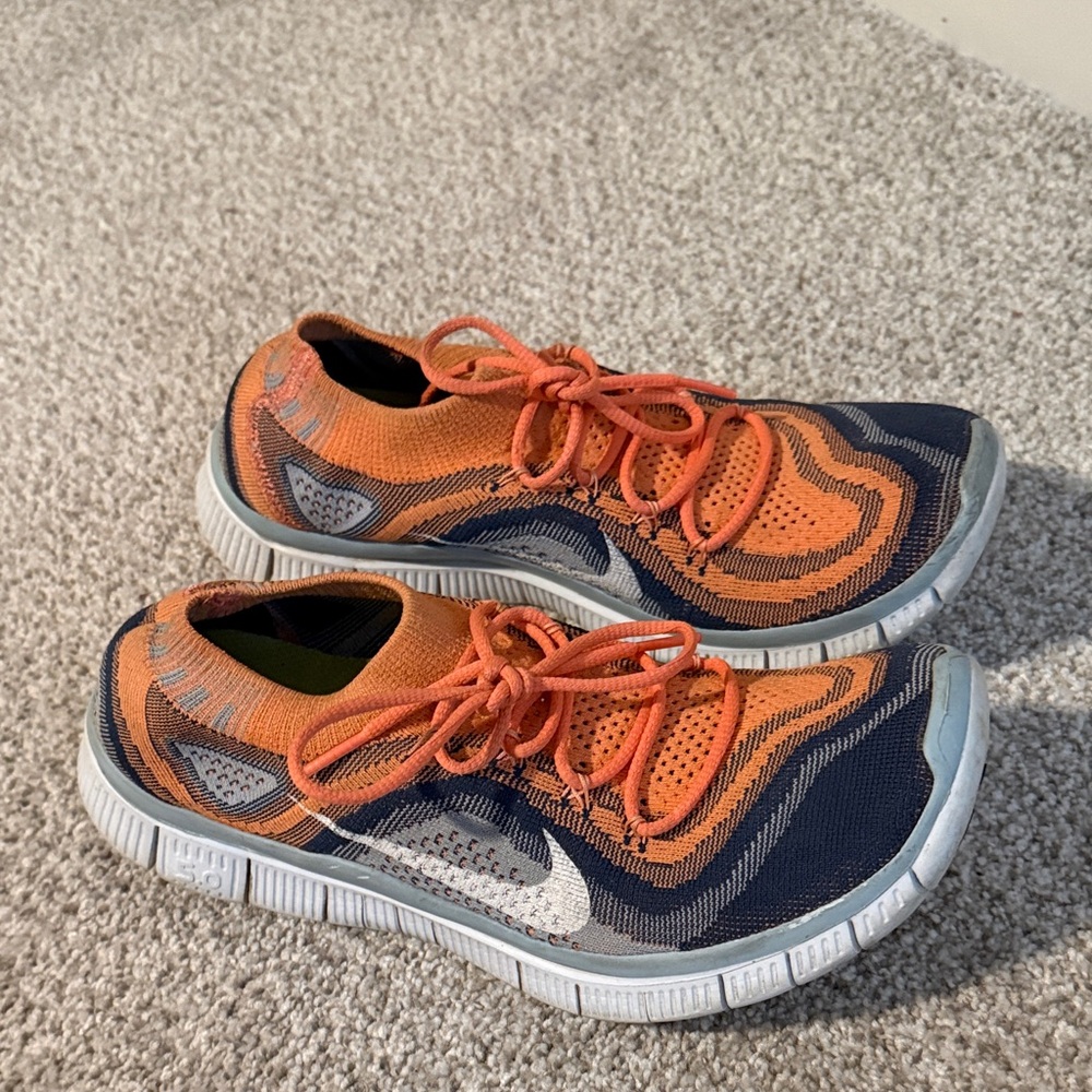 Women’s Nike Free navy blue, light blue and peach